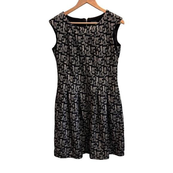Gabby Skye Women's Black Geometric Pleated Cap-Sleeve Fit and Flare Dress Sz 10 - Picture 1 of 8